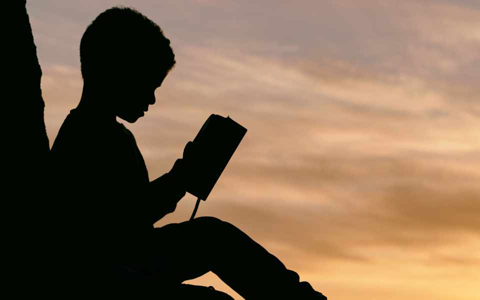 child with book